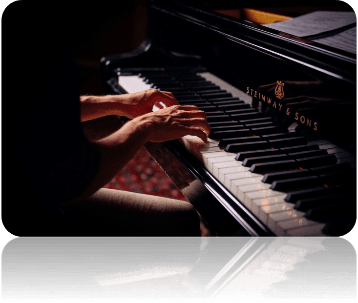 Une image contenant musique, piano, instrument de musique, clavier

Description générée automatiquement