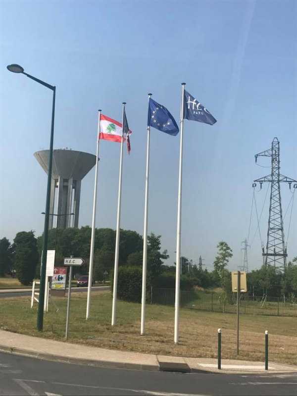 Our Lebanese flag flying next to HEC flag at the entrance of HEC HQ campus  in Jouy en Josas France! | HEC Alumni